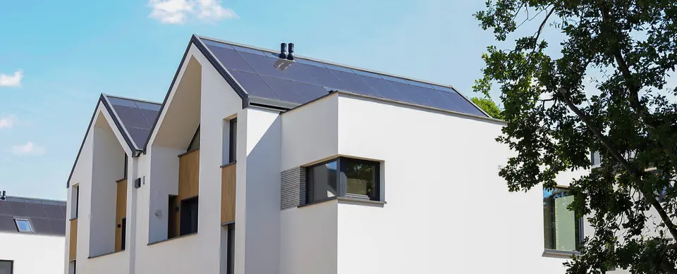 Semi-detached houses on the Borowiecka Park estate with integrated solar roofs