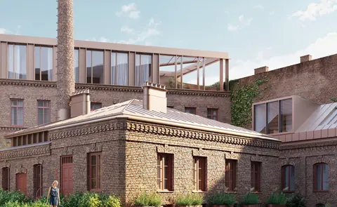 Visualisation of Cukry Praga – brick buildings of the former factory with its chimney