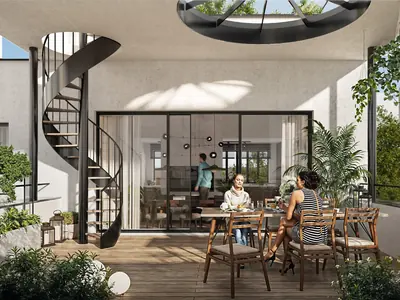 Terrace beneath a circular skylight with a spiral staircase