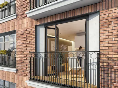Brick façade with a French balcony
