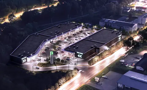 Night-time aerial visualisation of the Viva Park Cieszyn retail park