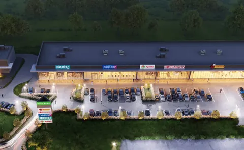 Night-time aerial visualisation of the Viva Park Rzeszów retail park
