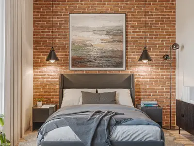 Bedroom with a brick wall