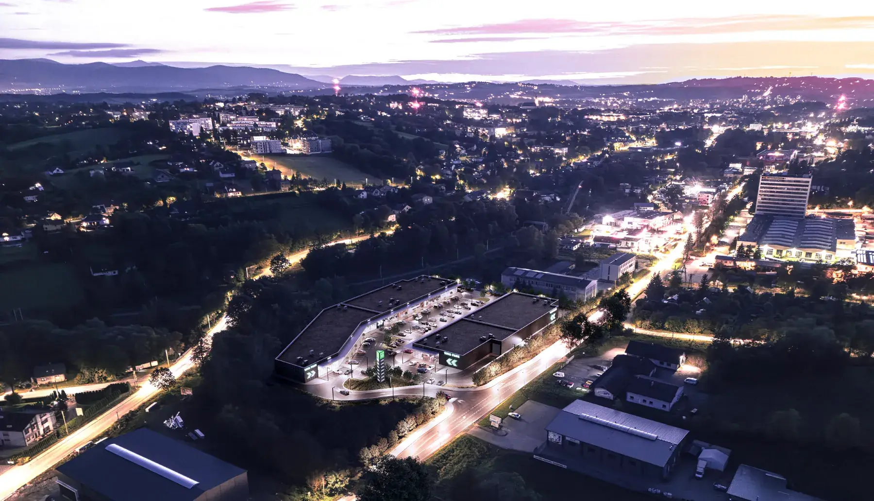 Nocna wizualizacja parku handlowego Viva Park Cieszyn z lotu ptaka